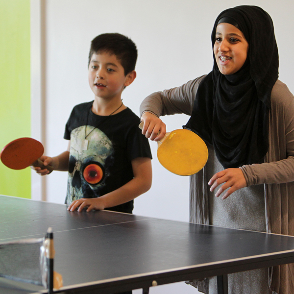 Kids playing table tennis